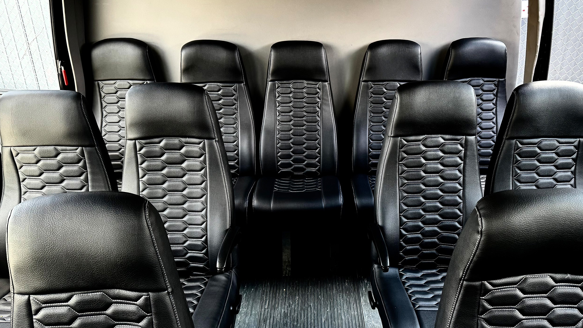 Luxury mini bus backseats with leather seating by Time Limousine
